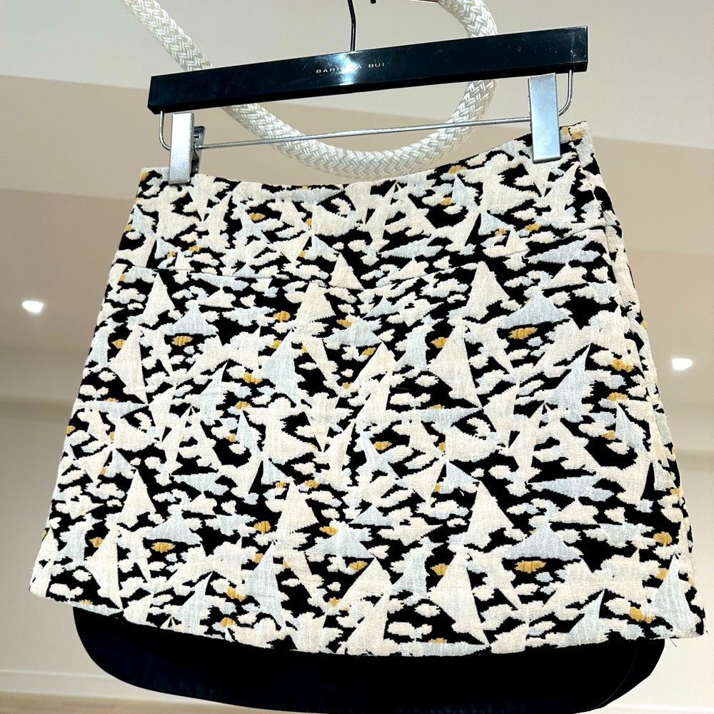 Sandro fabric and leather patterned mini skirt